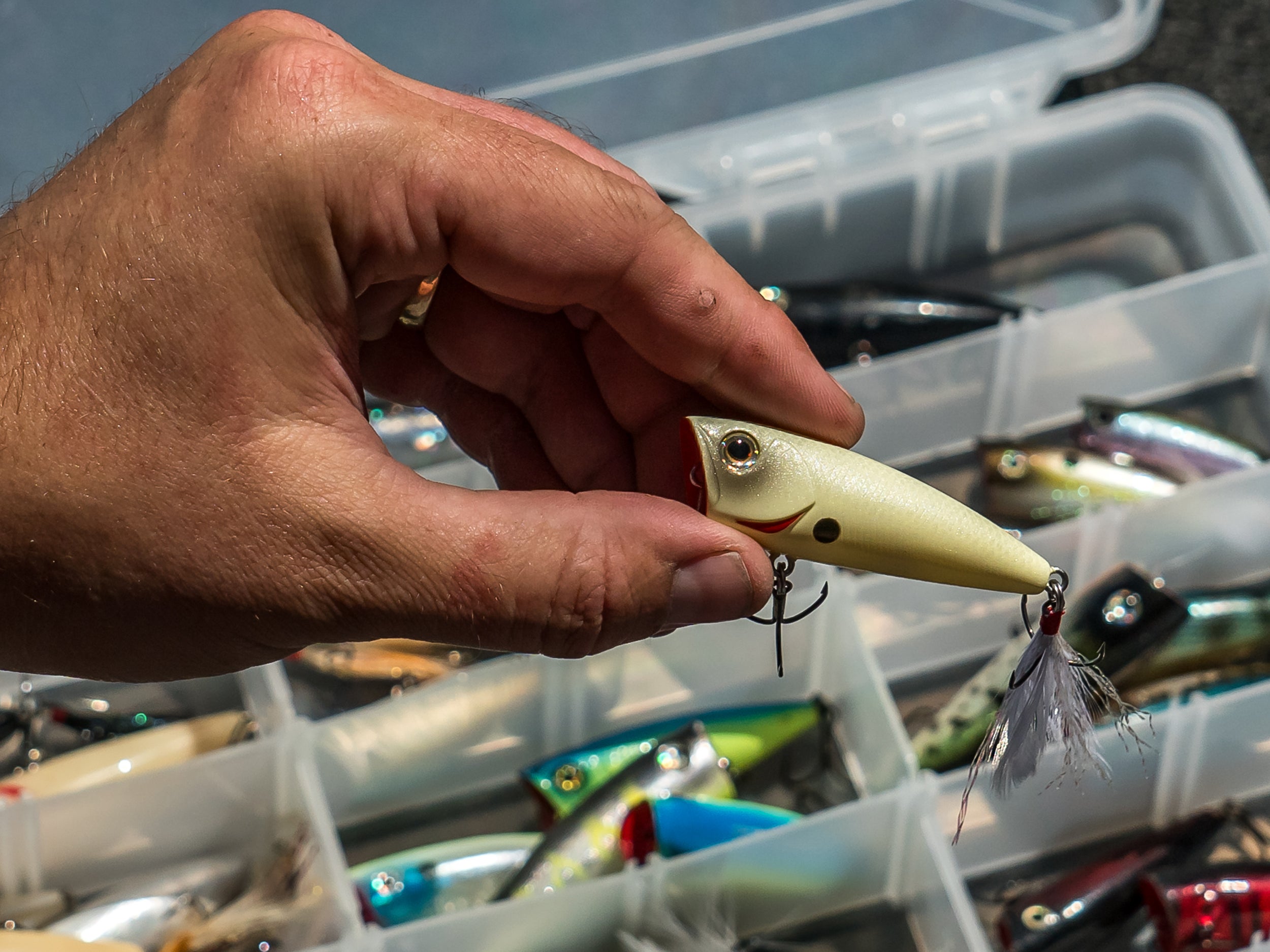 holding bone colored popper